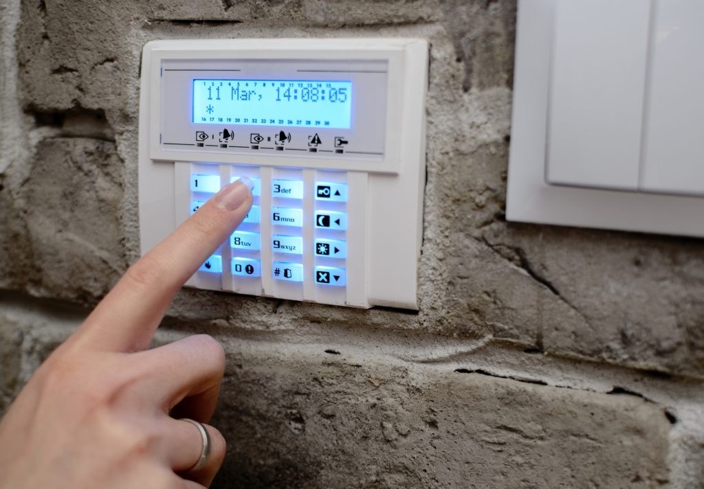 Closeup on woman's finger entering code